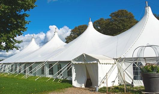 multiple portable restrooms for large-scale outdoor events, ensuring availability for all guests in Auburn